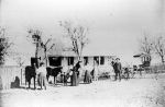 Heinrich and Anna Voigt family in front of home